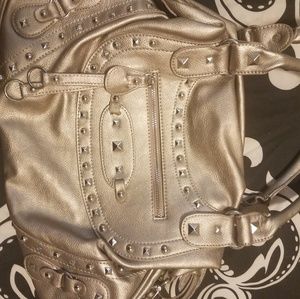 Studded bag with fun cheetah print liner